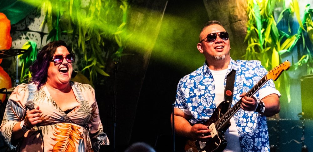 Singer and guitarist of The CJP Band mid-song